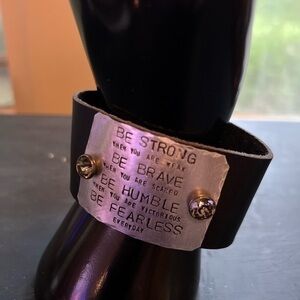 Black leather wrap bracelet, adjustable 2-snap closure. NWOT.